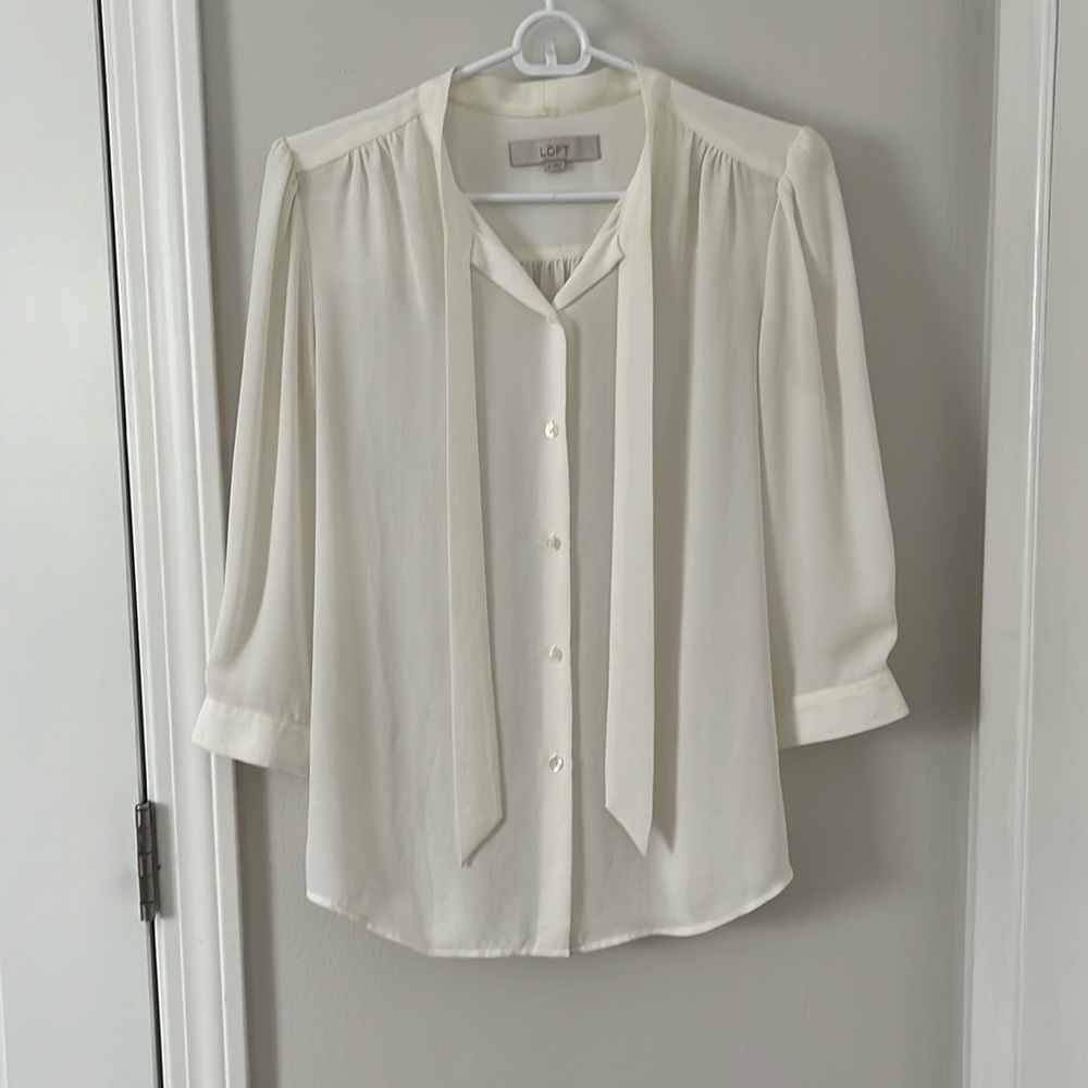 Loft cream 3/4 sleeve blouse with a few stains in size Small